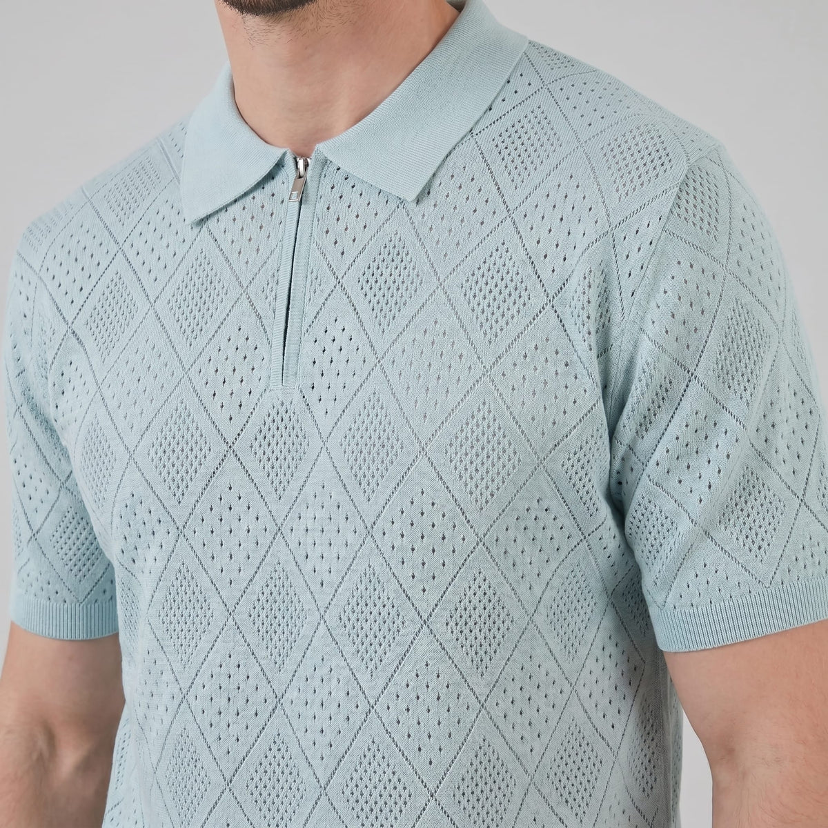 Porter Argyle Knit Quarter Zip Polo